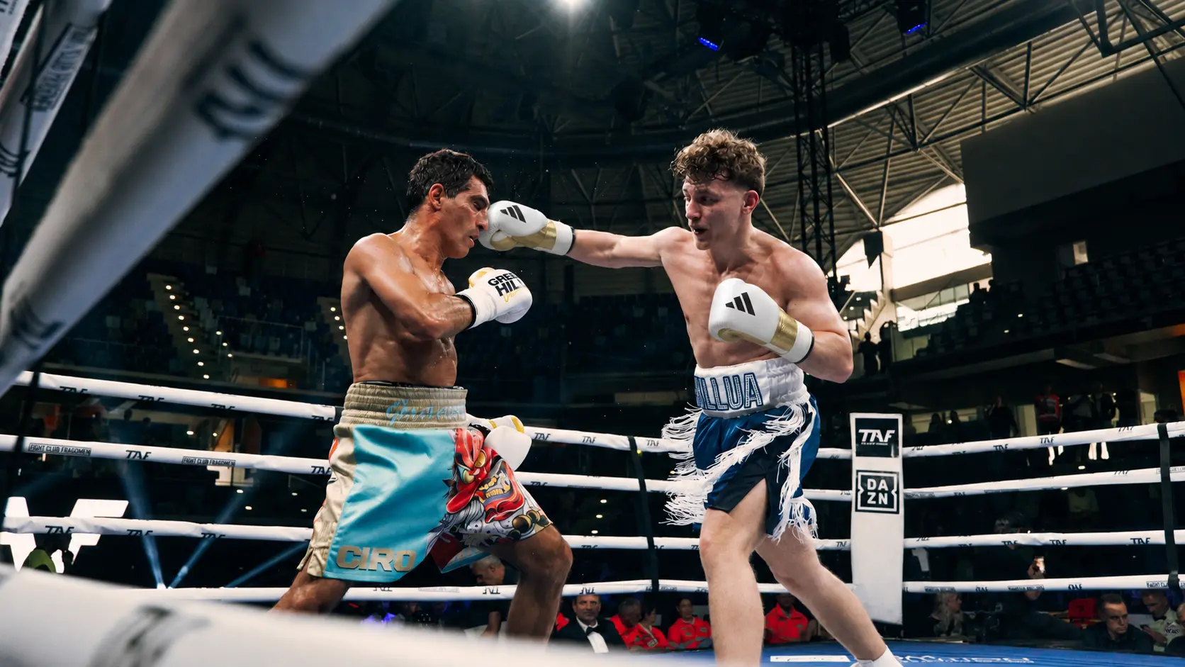 Alex Bindar lands a straight punch during a professional bout in Milan